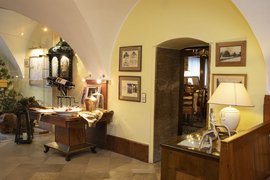 Week- Half-board Cozy interior with wooden furniture and warm lighting in a historic building