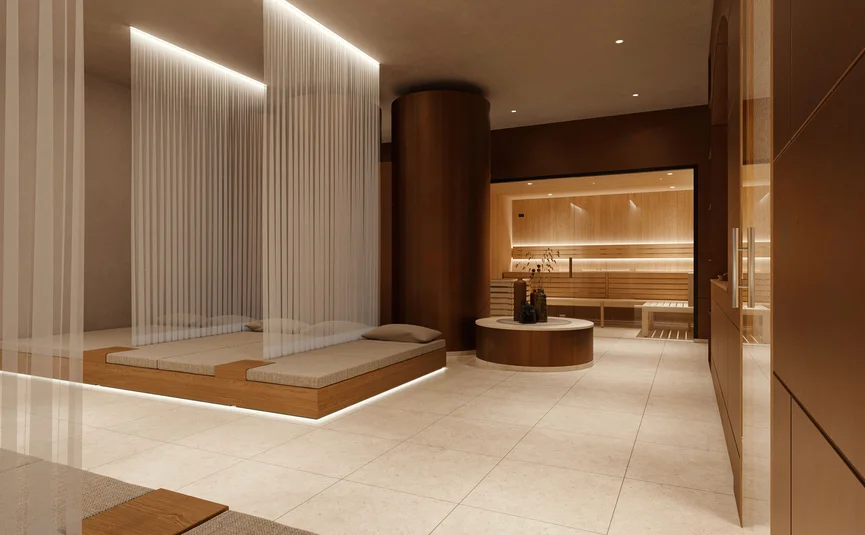Moderner Wellnessbereich mit Liegen, Vorhängen und Sauna im Hintergrund