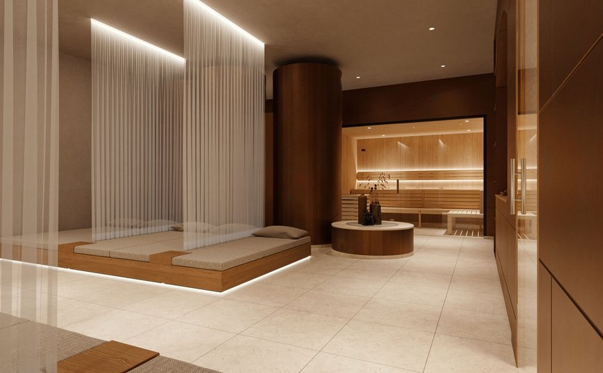 Modern spa area with loungers, curtains, and sauna in the background