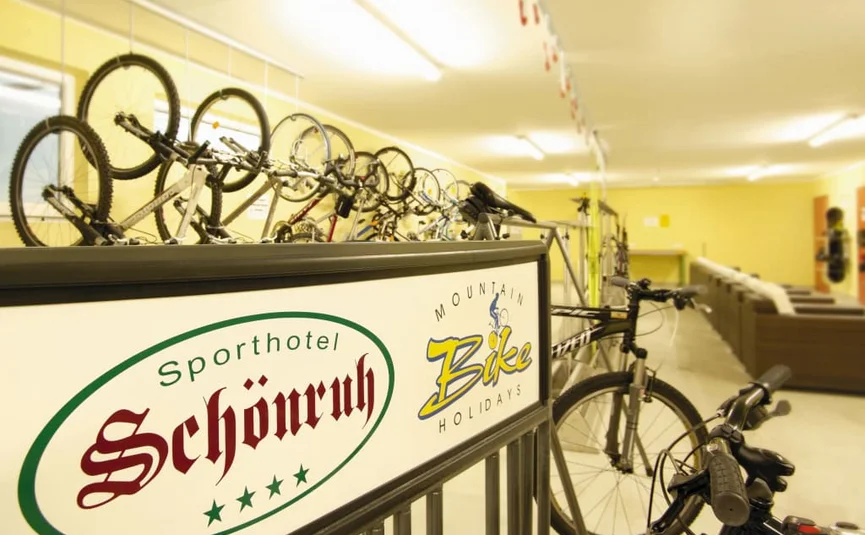View of bike storage room with mountain bikes at Sporthotel Schönruh