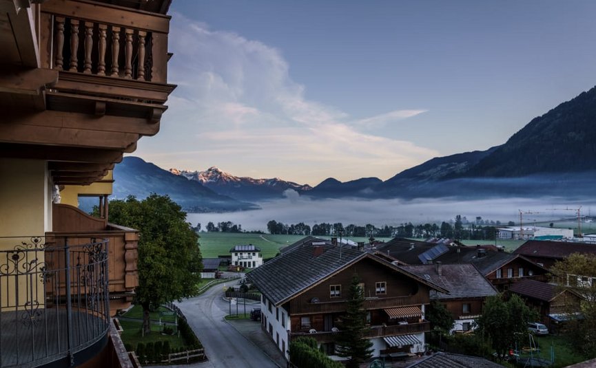 Activity holidays Village with mountains and fog in the valley at sunrise