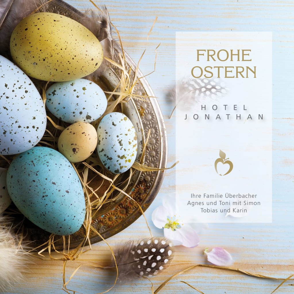 Colorful Easter eggs in a basket with text Happy Easter and Hotel Jonathan